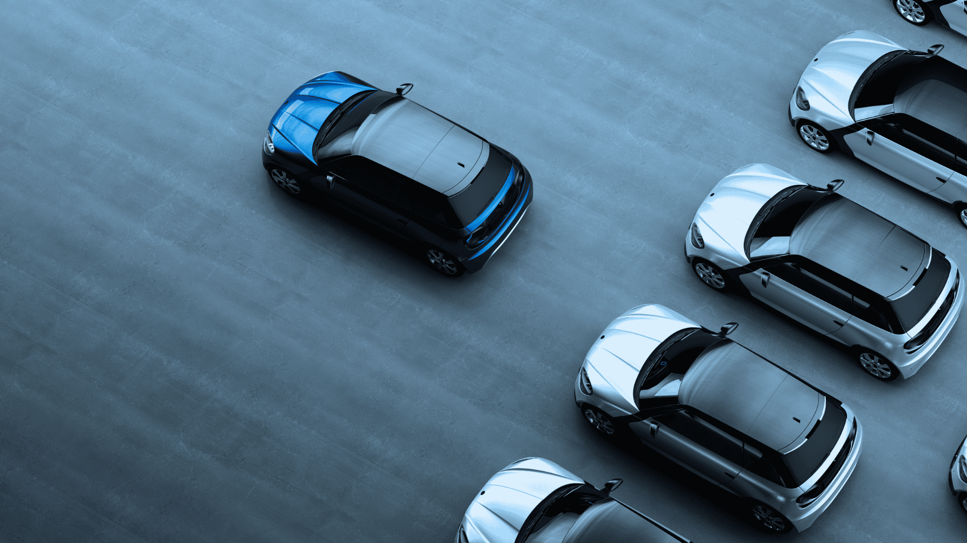 a group of cars parked on a road