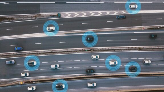 smart cars driving on the road, driverless vehicles, aerial top view from above